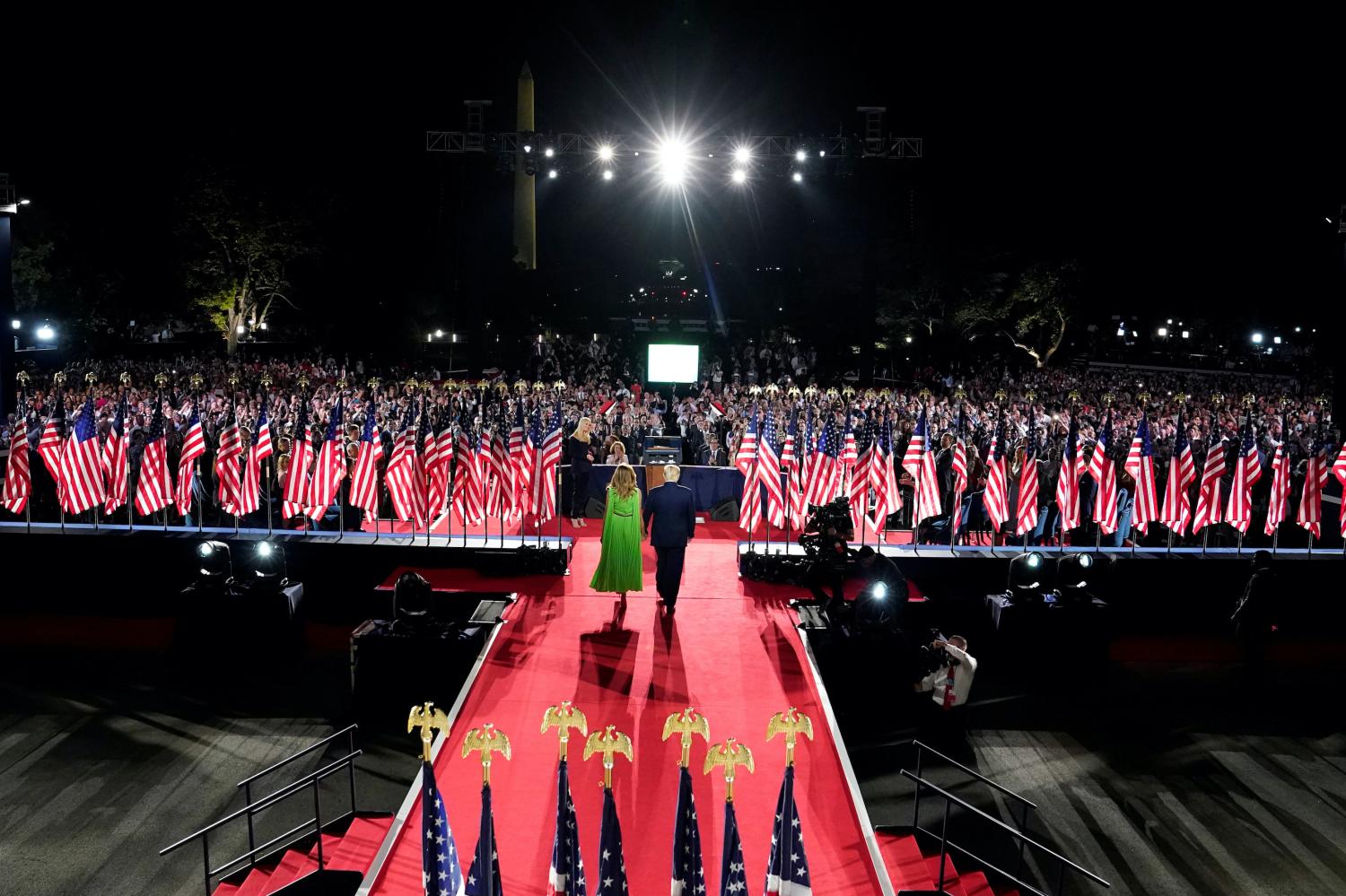 U.S. President Trump and first lady Melania Trump arrive for his acceptance speech for the Republican National Convention from the South Lawn of the White House in Washington, U.S., August 27, 2020. Doug Mills/Pool via REUTERS