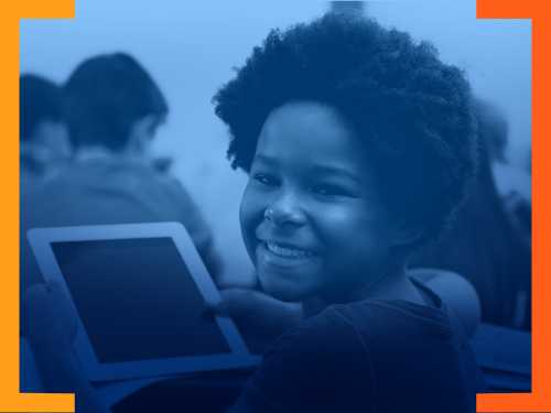 student in front of her laptop