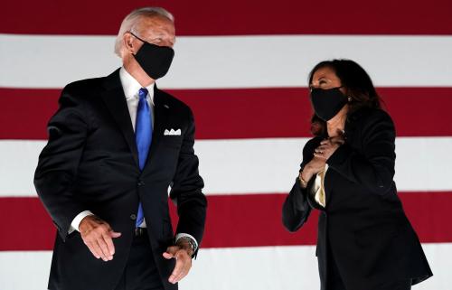 FILE PHOTO: Democratic presidential candidate and former Vice President Joe Biden and U.S. Senator and Democratic candidate for Vice President Kamala Harris celebrate after Joe Biden accepted the 2020 Democratic presidential nomination during the 4th and final night of the 2020 Democratic National ConventioN U.S. August 20, 2020. REUTERS/Kevin Lamarque/File Photo