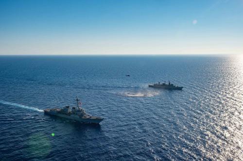 Hand out photo dated August 24, 2020 of Arleigh Burke-class guided-missile destroyer USS Winston S. Churchill (DDG 81) executes maneuvering drills with Greek Navy warship Kortenaer FF Class Aegean (F 460) off the coast of Crete, in the Mediterranean Sea. Tension is simmering in the waters of the Eastern Mediterranean as Greece and Turkey, NATO allies but historic rivals, inch toward a possible military confrontation that could end up engulfing the region. Naval vessels from both countries made a show of force in the contested region of the Eastern Mediterranean this week as a race for gas and oil reserves adds a new point of friction to old disputes. U.S. Navy photo by Mass Communication Specialist 3rd Class Louis Thompson Staats IV via ABACAPRESS.COM