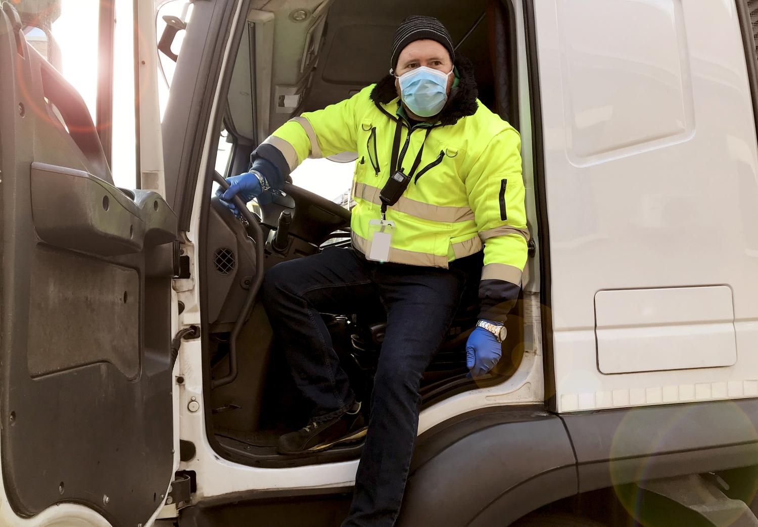 Delivery driver exiting vehicle