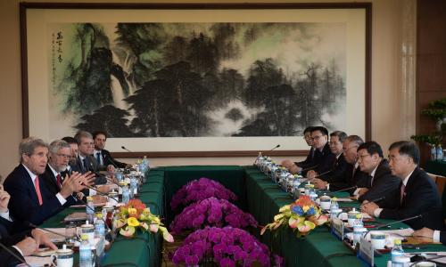 US Secretary of State John Kerry (L) speaks with Chinese Vice Premier Wang Yang (R) during a climate change meeting at the eight round of U.S-China strategic and economic dialogues & the seventh round of U.S-China high-level consultation on people-to-people exchange in Beijing on June 6, 2016. REUTERS/Nicolas Asfouri/Pool