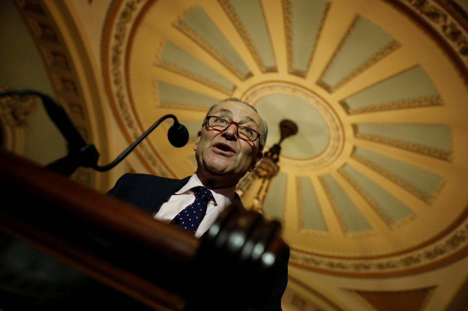 Senate Minority Leader Chuck Schumer speaks about the Tax Cuts and Jobs Acts at news conference following the weekly policy luncheons at the U.S. Capitol in Washington, U.S., December 19, 2017. REUTERS/Aaron P. Bernstein