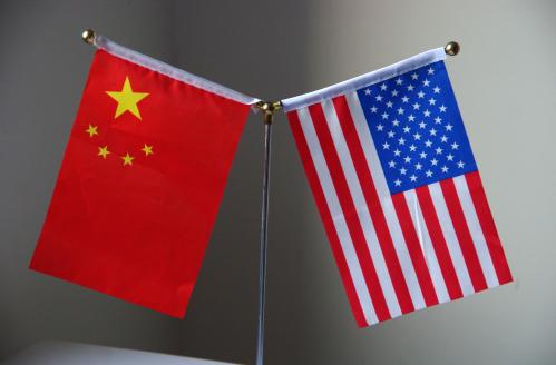 --FILE--Flags of China and the United States are pictured in Ji'nan city, east China's Shandong province, 4 June 2018.China on Tuesday (19 June 2018) urged the United States to be more rational concerning the ongoing trade issue and to stop undermining the interests of others as well as itself. Foreign Ministry spokesperson Geng Shuang made the remarks at a daily press briefing in response to a question on U.S. Secretary of State Mike Pompeo's recent speech at the Detroit Economic Club. According to reports, Pompeo blamed China's economic and trade policy for the trade issue in his speech Monday and said the United States will respond to "protect American property." "The spokesperson for the Ministry of Commerce has already declared China's solemn position on the economy and trade," said Geng, pointing out that the U.S. has confused right and wrong and the purpose of the accusation is to disguise its unilateralism and protectionism policy.No Use China. No Use France.