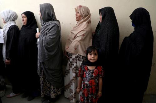 Afghan women line up at a polling station as they wait to cast their votes in Kabul, Afghanistan September 28, 2019.REUTERS/Omar Sobhani