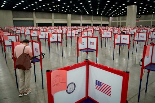FILE PHOTO: FILE PHOTO: A voter completes his ballot on the day of the primary election in Louisville, Kentucky, U.S. June 23, 2020. REUTERS/Bryan Woolston/File Photo