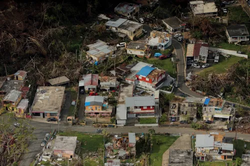 FILE PHOTO: Hurricane Maria, 2017:   Maria would result in the worst natural disaster in the history of Puerto Rico, causing an estimated $90 billion in damage to the already economically struggling U.S. territory. Months after the storm, a research team led by Harvard University estimated the death toll at 4,645, not the 64 pegged by the island's government. The researchers estimate one-third perished because of delayed or interrupted medical care.  REUTERS/Lucas Jackson/File Photo