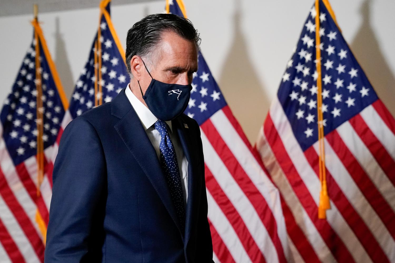 U.S. Senator Mitt Romney (R-UT) arrives to a luncheon on Capitol Hill in Washington, U.S., September 23, 2020. REUTERS/Erin Scott
