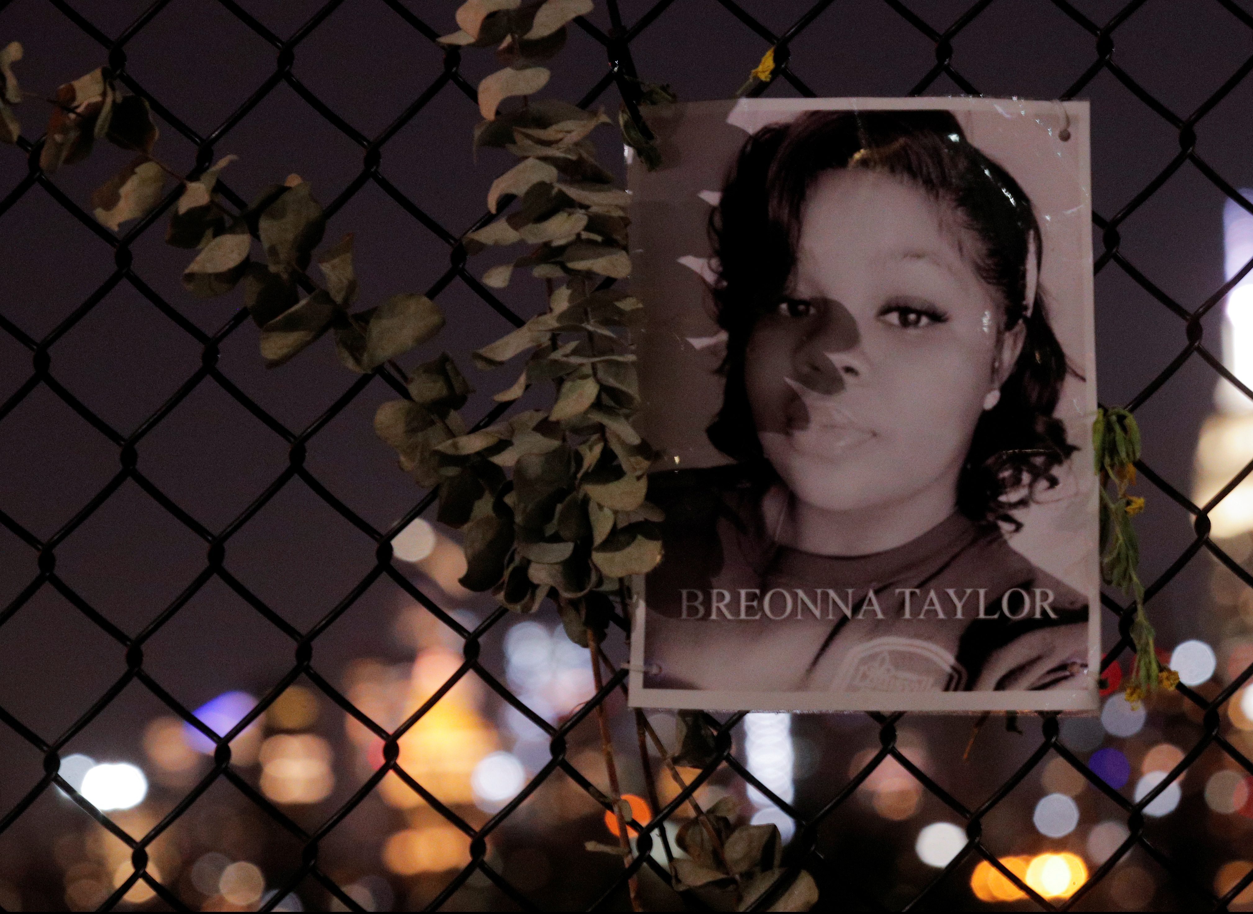 A picture of Breonna Taylor is seen at a makeshift memorial for victims of racial injustice, following the announcement of a single indictment in Taylor's case, in the Brooklyn borough of New York City, New York, U.S., September 24, 2020. REUTERS/Brendan McDermid TPX IMAGES OF THE DAY