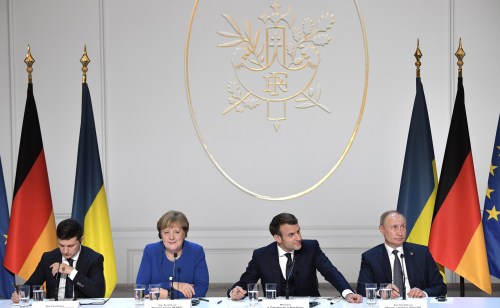 (L-R) Ukrainian President Volodymyr Zelensky, German Chancellor Angela Merkel, French President Emmanuel Macron, and Russian President Vladimir Putin, attend a joint press conference at the Elysee Palace after holding the Normandy Format Summit. Russia has expressed doubts that a planned Berlin summit to resolve the Ukraine conflict will in fact take place, with Deputy Foreign Minister Andrey Rudenko saying Kiev has done little to fulfil agreements made at an earlier summit between the warring sides.