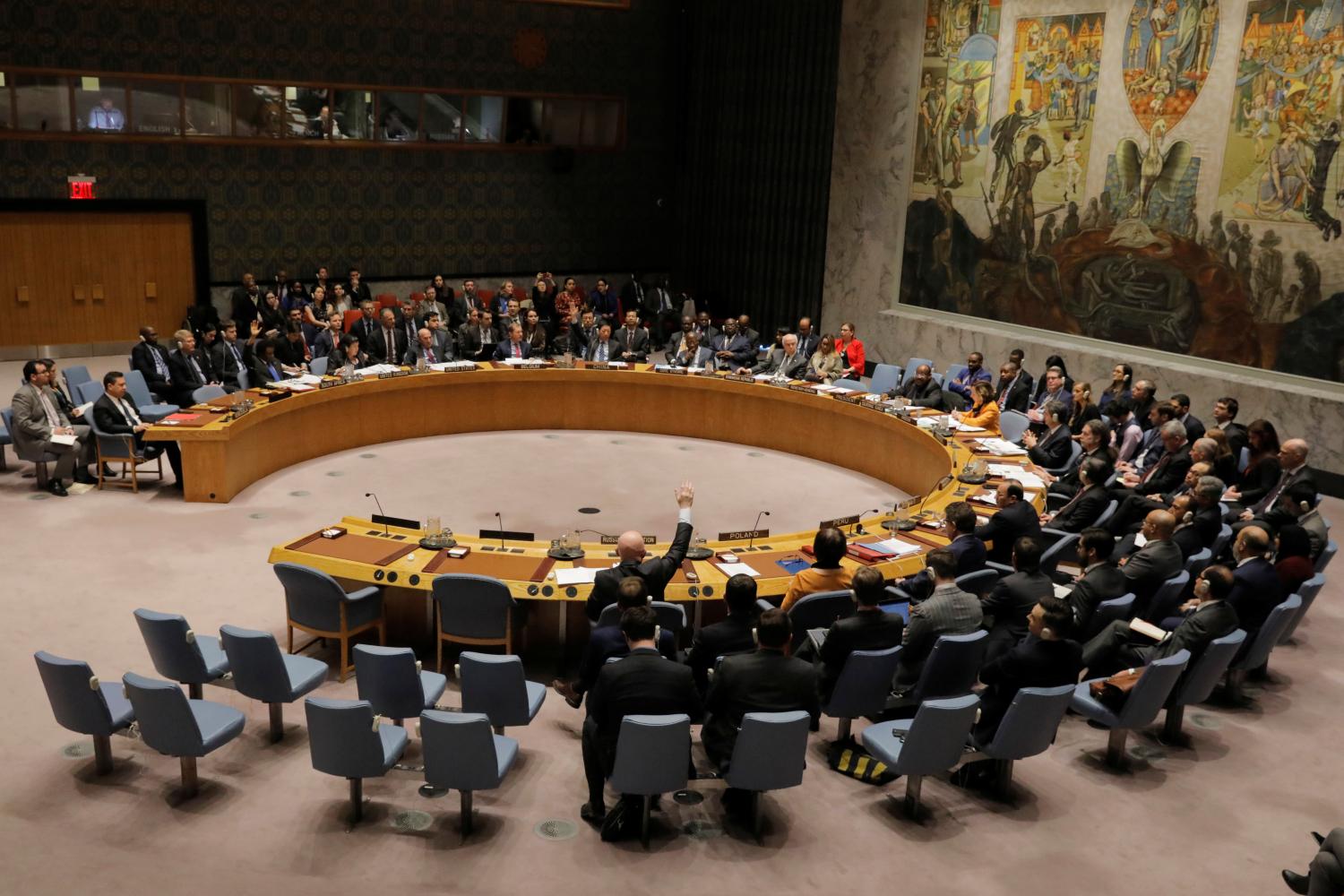 Members of the U.N. Security Council, including representatives from Russia, China, and South Africa vote against a U.S. draft resolution calling for free and fair presidential elections in Venezuela at U.N. headquarters in New York, U.S., February 28, 2019. REUTERS/Lucas Jackson - RC166DE52B80