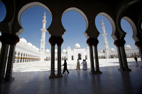 Muslims walk inside Sheikh Zayed mosque in Abu Dhabi April 7, 2009. The mosque, one of the world's largest, is named after Sheikh Zayed bin Sultan al-Nahayan the founder and first president of the UAE who is also buried there. REUTERS/Ahmed Jadallah (UNITED ARAB EMIRATES SOCIETY RELIGION IMAGE OF THE DAY TOP PICTURE)