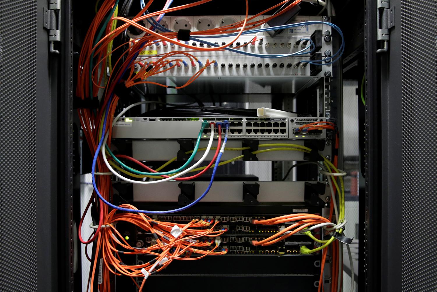 Computer network equipment is seen in a server room in Vienna, Austria, October 25, 2018. REUTERS/Heinz-Peter Bader