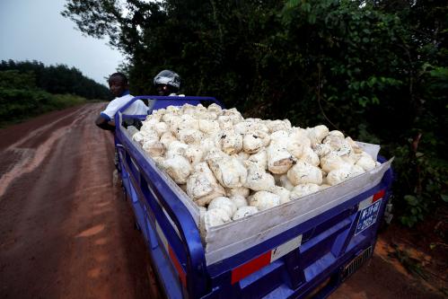 A man looks behind as he drives a truck transporting rubber for sale in Nsuaem, Ghana November 24, 2018.Picture taken November 24, 2018. REUTERS/Zohra Bensemra