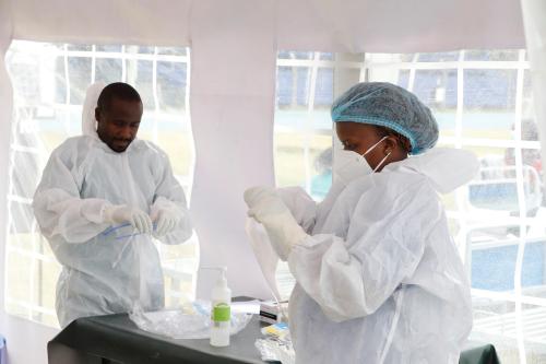 Nurse Beryl Negesa wears a protective suit before entering a field hospital builtÊon a soccer stadium in Machakos, as the number of confirmed coronavirus disease (COVID-19) cases continues to rise in Kenya, July 23, 2020. Picture taken July 23, 2020. REUTERS/Baz Ratner