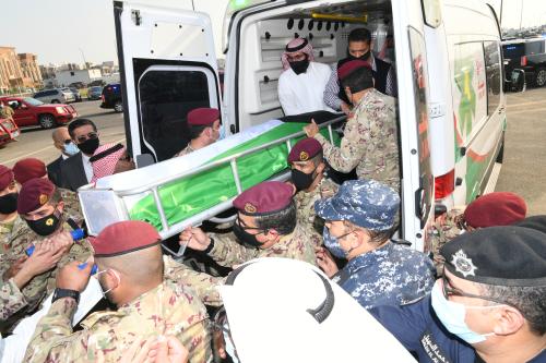 The body of Kuwait's late Emir Sheikh Sabah al-Ahmed al-Sabah, who died after treatment in U.S., is carried by officials during his funeral procession, in Kuwait City, Kuwait September 30, 2020. Kuwait News Agency/Handout Via REUTERS ATTENTION EDITORS - THIS IMAGES WAS PROVIDED BY A THIRD PARTY. NO RESALES. NO ARCHIVES.