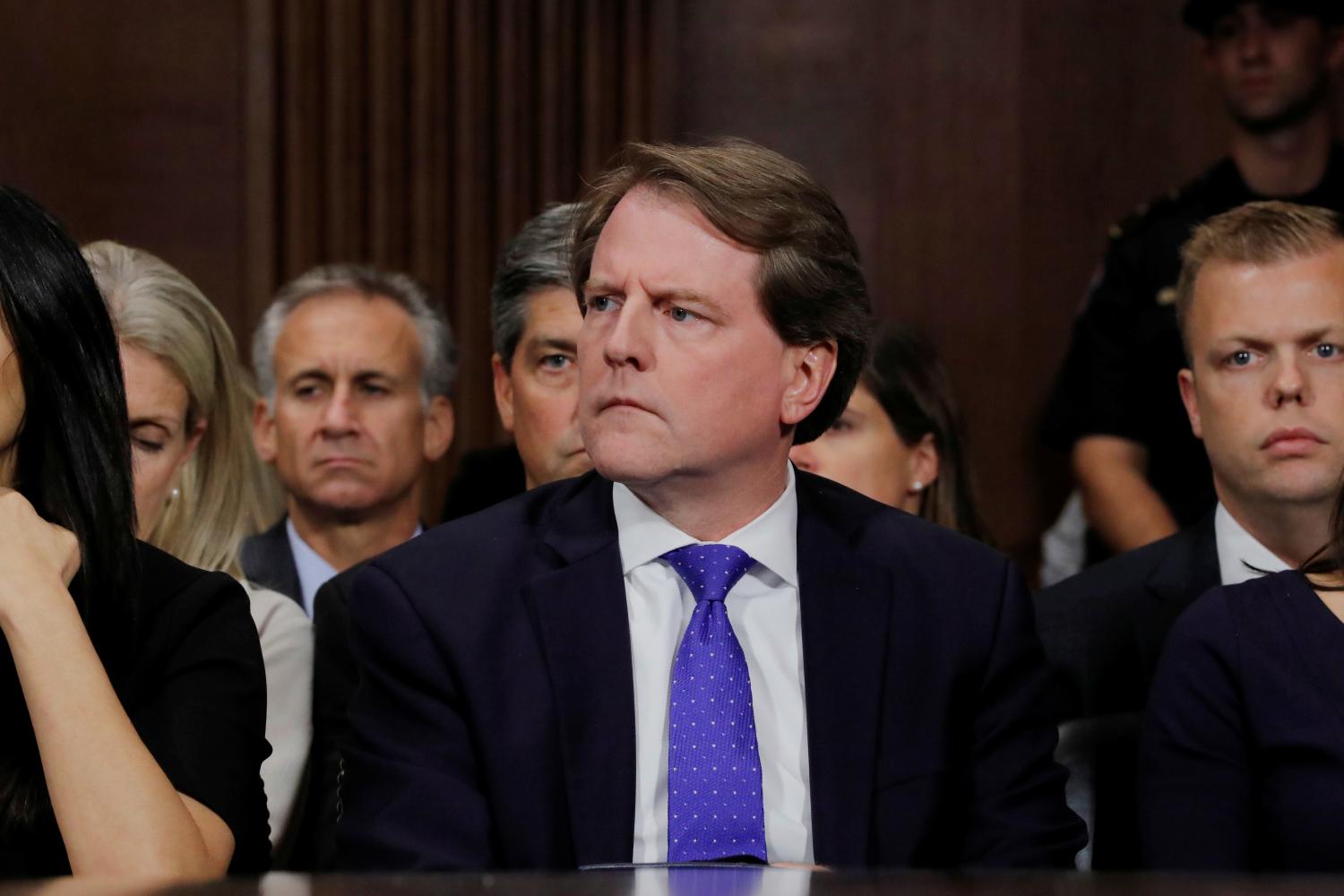White House counsel Don Mcgahn listens to U.S. Supreme Court nominee Brett Kavanaugh testify before a Senate Judiciary Committee confirmation hearing on Capitol Hill in Washington, U.S., September 27, 2018. REUTERS/Jim Bourg