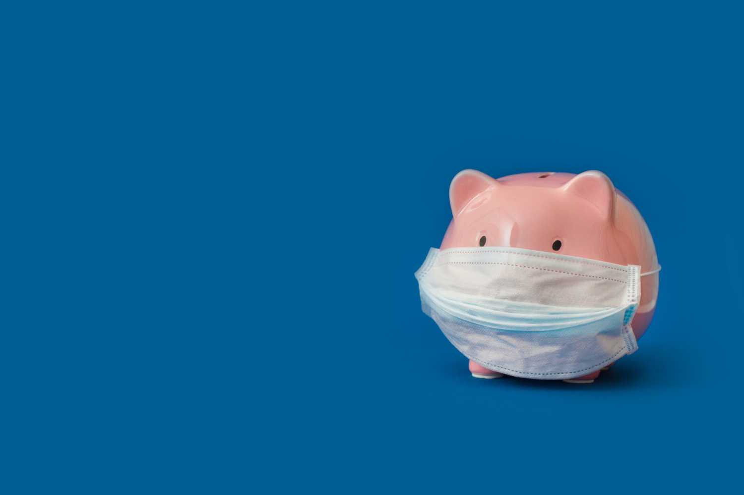 Piggy Bank with a surgical mask on.