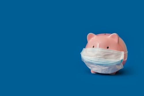 Piggy Bank with a surgical mask on.