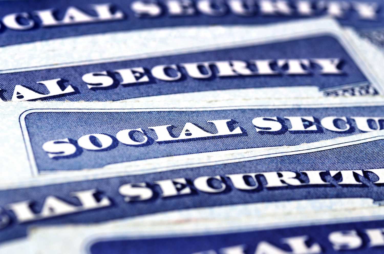 A stack of social security cards.