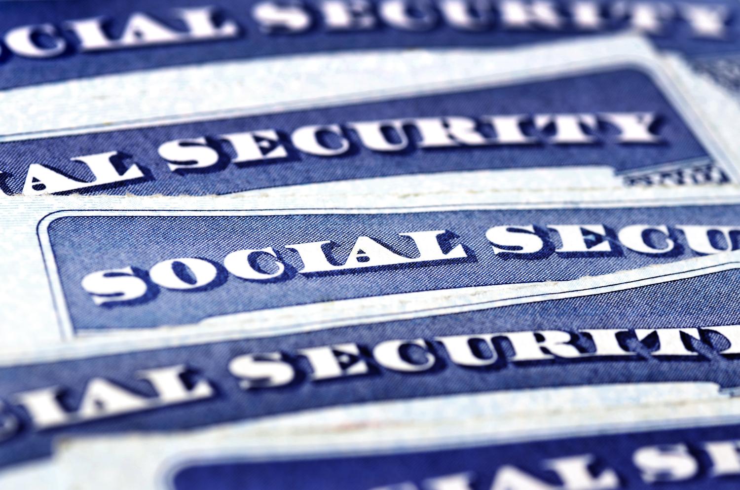A stack of social security cards.