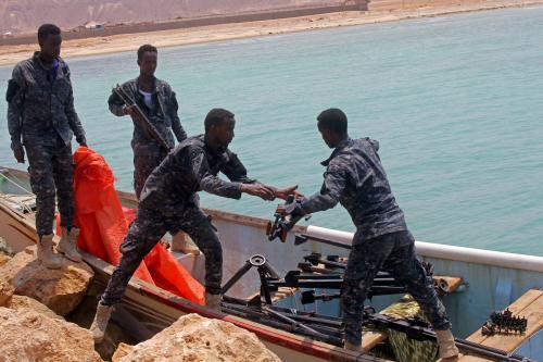 FILE PHOTO: Somali Puntland forces receive weapons seized in a boat on the shores of the Gulf of Aden in the city of Bosasso, Puntland region, Somalia September 23, 2017. REUTERS/Abdiqani Hassan/File Photo
