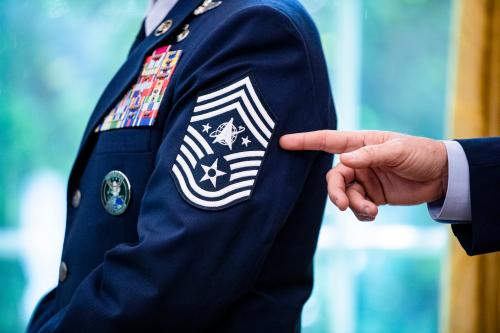 WASHINGTON, D.C. - MAY 15: Gen. Jay Raymond, Chief of Space Operations, points to the newly designed rank insignia of CMSgt Roger Towberman, the senior most  enlisted in the US Space Force, while President Donald Trump signs the 2020 Armed Forces Day Proclamation and presentation of the official flag of the United States Space Force at the White House in Washington, D.C. on May 15, 2020.No Use UK. No Use Germany.