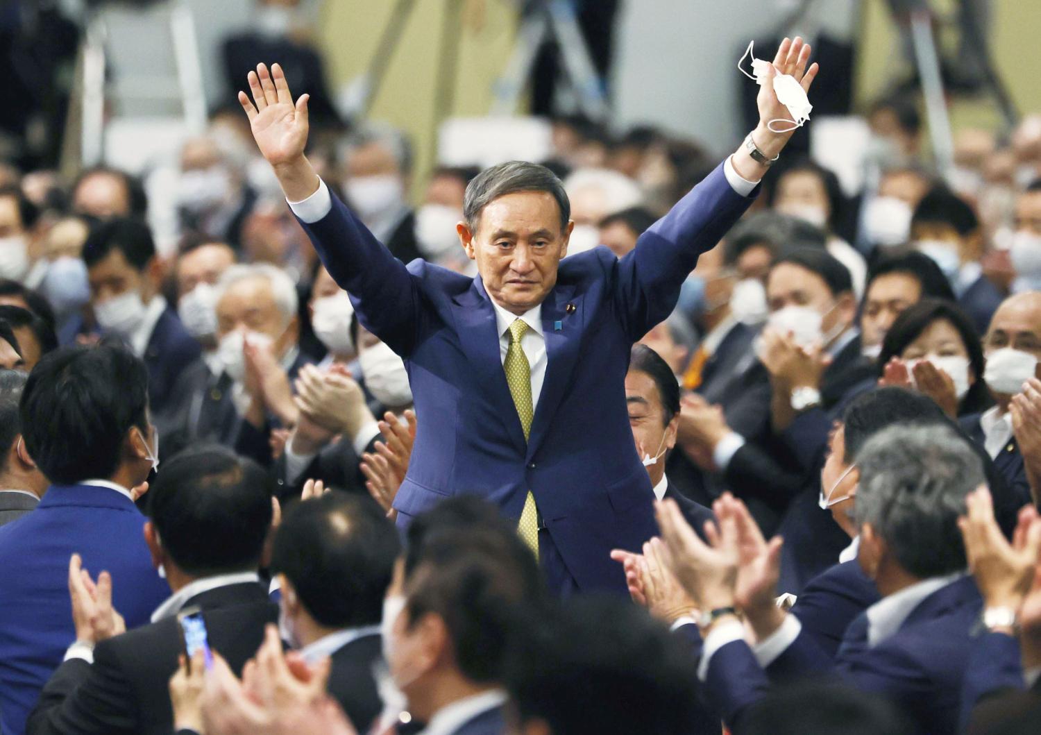 Japanese Chief Cabinet Secretary Suga gestures as he is elected as new head of the ruling party at the Liberal Democratic Party's (LDP) leadership election in Tokyo | Credit: Kyodo