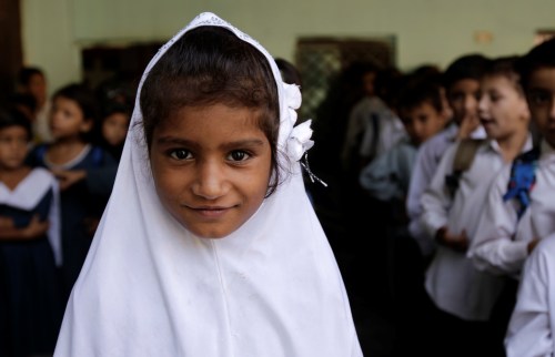 A girl attends morning assembly at the Mashal Model school in Islamabad, Pakistan, September 29, 2017. REUTERS/Caren Firouz  SEARCH "FIROUZ EDUCATION" FOR THIS STORY. SEARCH "WIDER IMAGE" FOR ALL STORIES.