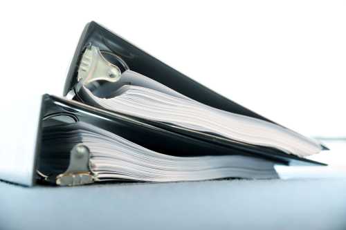 Official binders given to reporters with Special Counsel Robert Mueller's report on Russian interference in the 2016 U.S. presidential election are seen in Washington, U.S., April 18, 2019. REUTERS/Jonathan Ernst