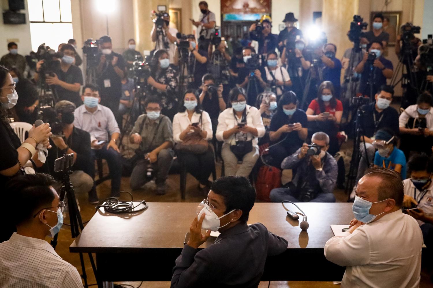 Maria Ressa, Executive Editor and CEO of Philippine news website Rappler, faces the media with former Rappler reporter Reynaldo Santos Jr., and lawyer Ted Te, after being found guilty of cyber-libel, in Manila, Philippines, June 15, 2020. REUTERS/Eloisa Lopez