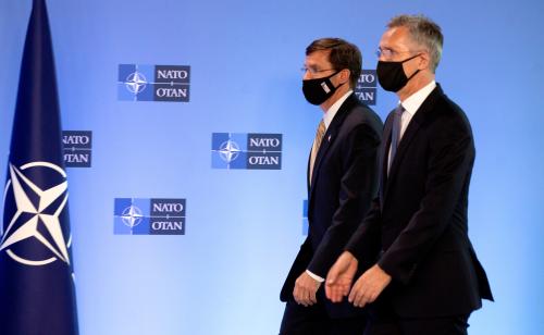 NATO Secretary General Jens Stoltenberg walks with U.S. Secretary of Defense Mark Esper prior to a news conference at NATO headquarters in Brussels, Belgium June 26, 2020. Virginia Mayo/Pool via REUTERS