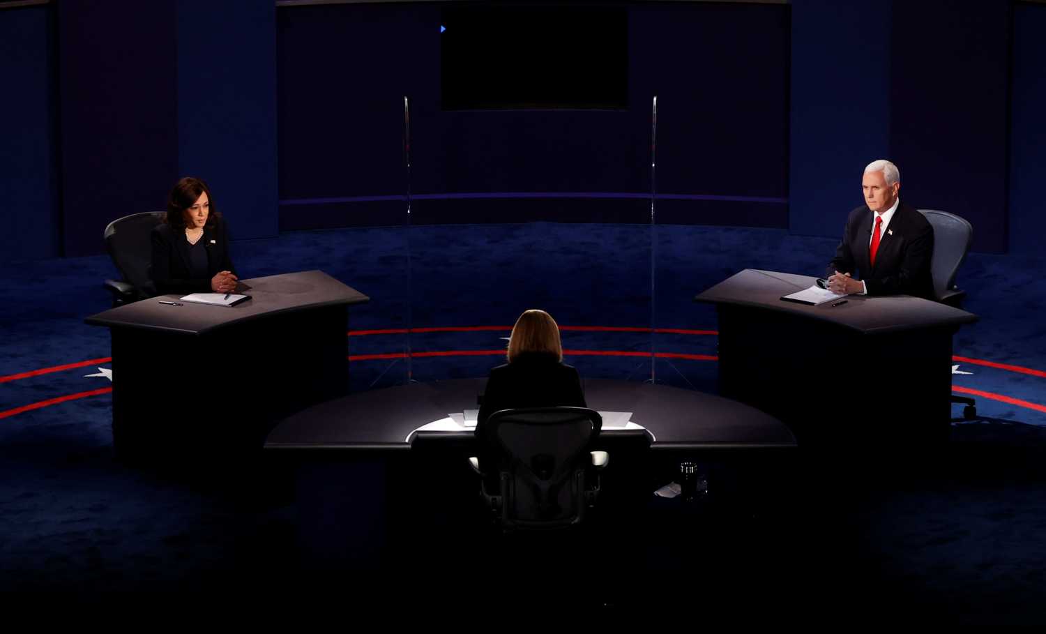 Democratic vice presidential nominee Senator Kamala Harris and U.S. Vice President Mike Pence participate in their 2020 vice presidential campaign debate held on the campus of the University of Utah in Salt Lake City, Utah, U.S., October 7, 2020. REUTERS/Brian Snyder