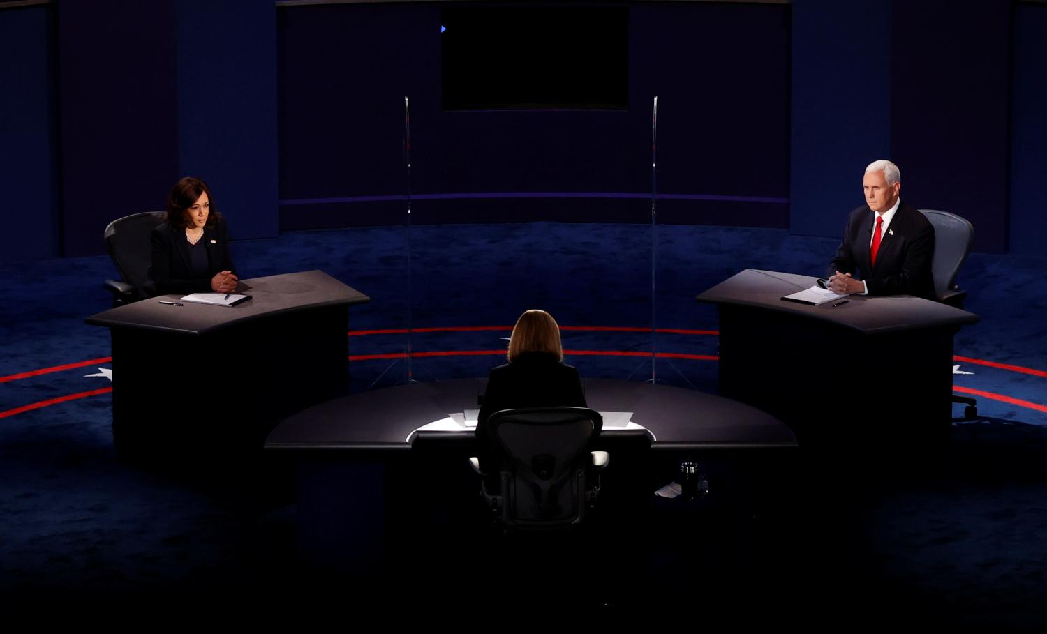 Democratic vice presidential nominee Senator Kamala Harris and U.S. Vice President Mike Pence participate in their 2020 vice presidential campaign debate held on the campus of the University of Utah in Salt Lake City, Utah, U.S., October 7, 2020. REUTERS/Brian Snyder