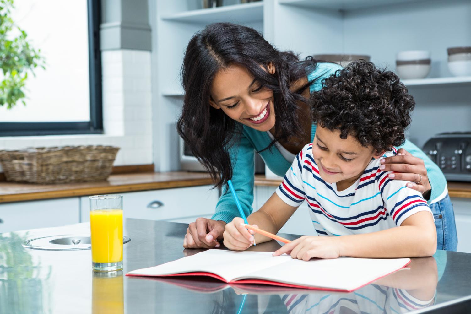 mother and child do school work together