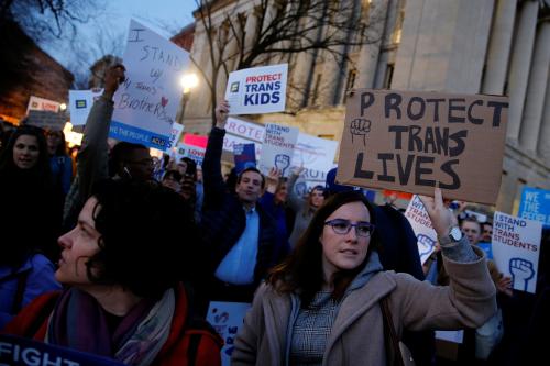 Transgender activists and supporters protest potential changes by the Trump administration in federal guidelines issued to public schools in defense of transgender student rights, near the White House in Washington, U.S. February 22, 2017. REUTERS/Jonathan Ernst