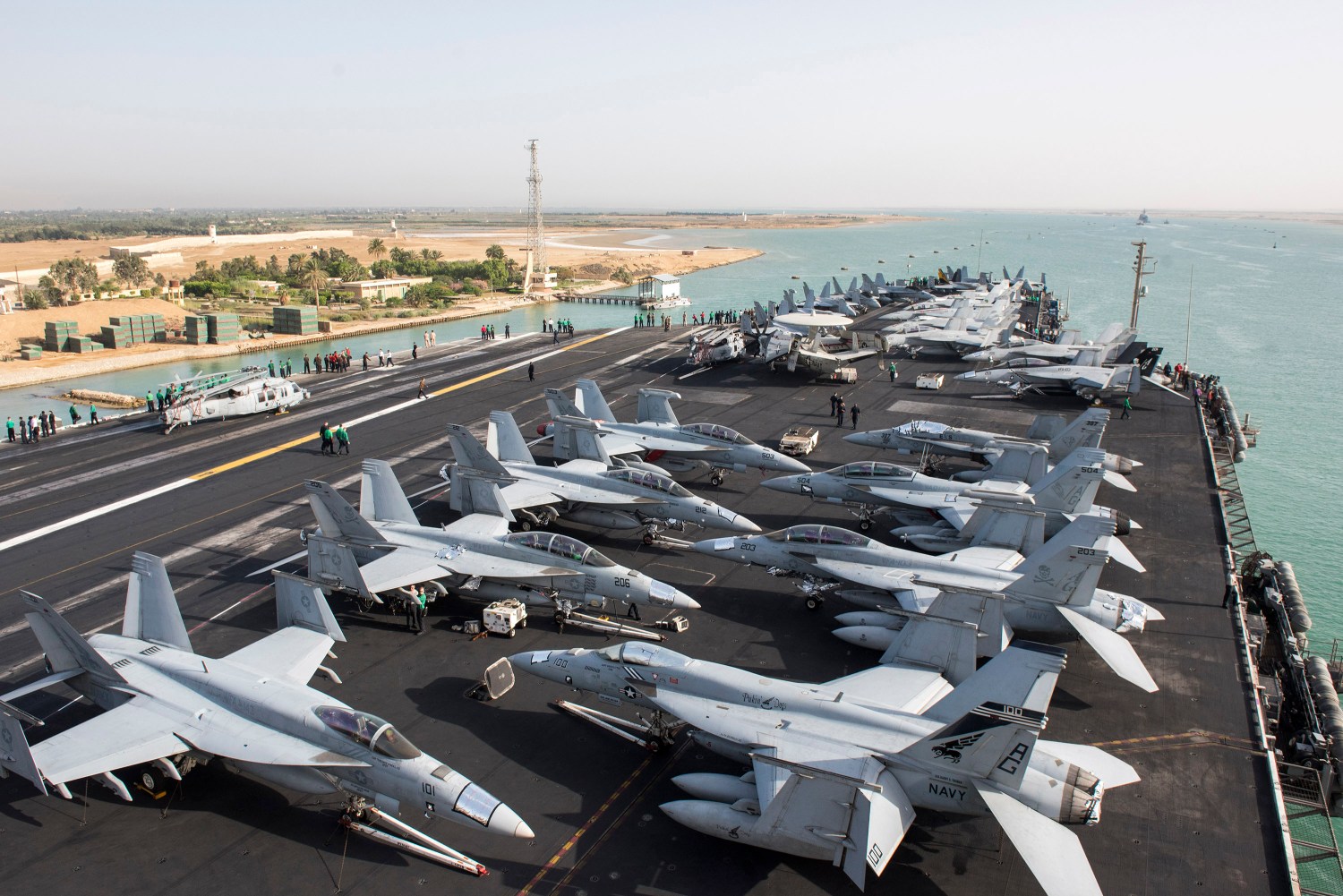 The US Navy aircraft carrier USS Harry S. Truman transits the Suez Canal, Egypt towards the Mediterranean Sea in a photo released by the US Navy June 2, 2016. U.S. fighter jets on Friday launched strikes against Islamic State from the USS Harry S. Truman aircraft carrier, the U.S. Navy said, marking the first time a U.S. aircraft carrier targeted areas in the Middle East from the Mediterranean since the Iraq War began in 2003.    U.S. Navy/Mass Communication Specialist 3rd Class Anthony Flynn/Handout via REUTERS   ATTENTION EDITORS - THIS PICTURE WAS PROVIDED BY A THIRD PARTY. FOR EDITORIAL USE ONLY