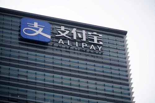 FILE PHOTO: The Alipay logo is pictured on a building at the Shanghai office of Alipay, owned by Ant Group, an affiliate of e-commerce giant Alibaba, Shanghai, China, Sept. 14, 2020. REUTERS/Aly Song/File Photo