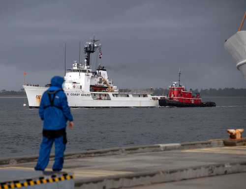 The U.S Coast Guard Cutter Diligence (WMEC-616) arrives at its new homeport at Naval Air Station Pensacola on a stormy day Monday, July 27, 2020. The 210-foot Reliance-class cutter joins the cutters Decisive and the Dauntless currently calling Pensacola home.Uscg Homeport Diligence