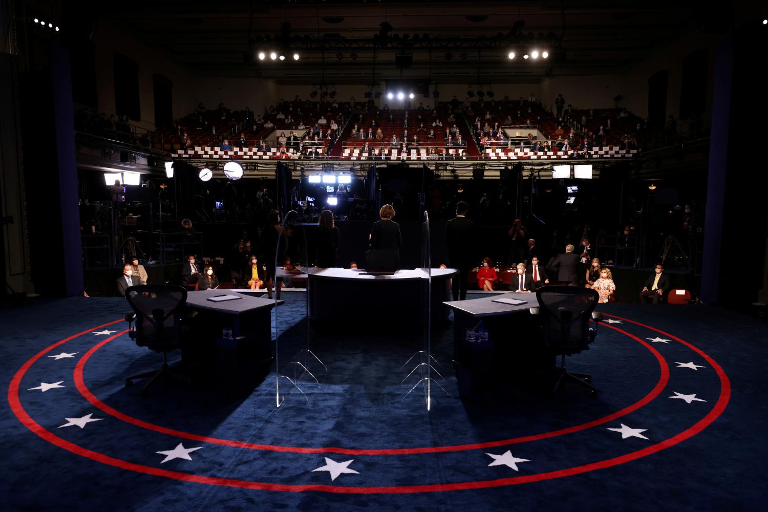 FILE PHOTO: FILE PHOTO: The debate stage is prepared to the 2020 vice presidential debate between U.S. Vice President Mike Pence and Democratic vice presidential nominee and U.S. Senator Kamala Harris on the campus of the University of Utah in Salt Lake City, Utah, U.S., October 7, 2020. Justin Sullivan/Pool via REUTERS/File Photo/File Photo