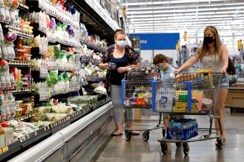FILE PHOTO: Shoppers are seen wearing masks while shopping at a Walmart store in Bradford, Pennsylvania, U.S. July 20, 2020. REUTERS/Brendan McDermid/File Photo/File Photo