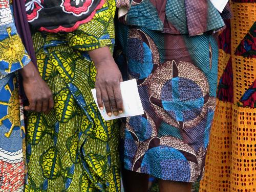 Women wait to cast their ballots at a polling station during the Guinea's presidential election in Fria, Guinea October 18, 2020. REUTERS/Saliou Samb  NO RESALES. NO ARCHIVES