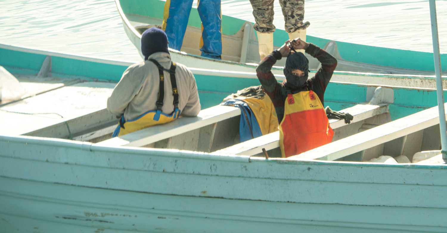 Masked men on skiffs are seen fishing illegally inside the Vaquita Refuge, a UNESCO World Heritage Site located in Mexico’s Upper Gulf of California, off San Felipe, Baja California, Mexico March 3, 2020 in this picture released by the Sea Shepherd. Sea Shepherd/Handout via REUTERS   ATTENTION EDITORS - THIS IMAGE HAS BEEN SUPPLIED BY A THIRD PARTY. MANDATORY CREDIT SEA SHEPHERD.