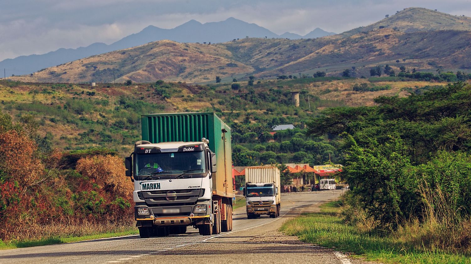 Kasese, Kasese / Uganda - Apr 15, 2017: Cargo trucks passing Uganda Border