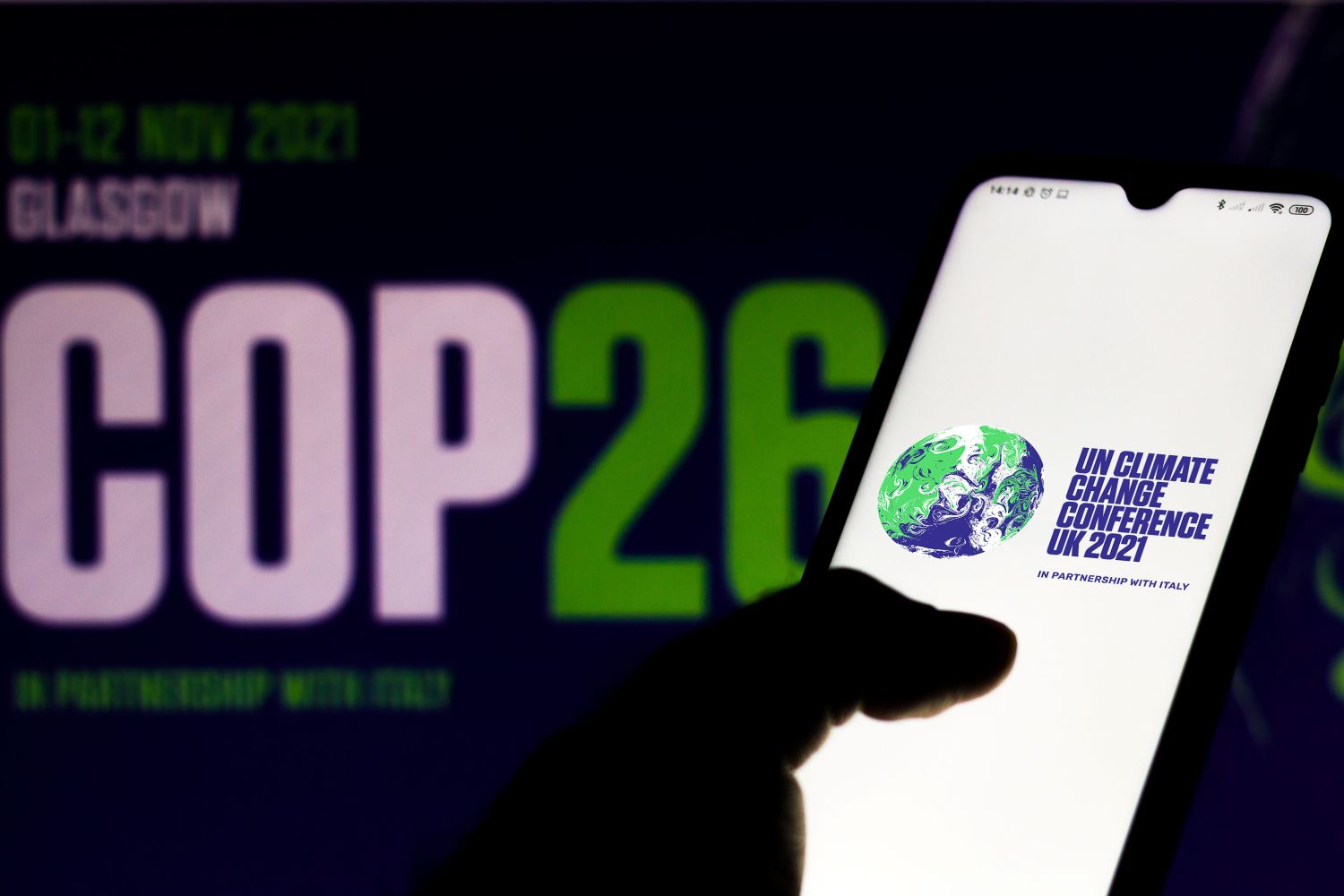 July 19, 2020, Brazil. In this photo illustration the 2021 United Nations Climate Change Conference (COP26) logo seen displayed on a smartphone
