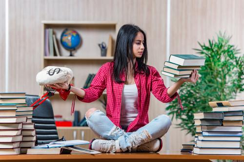 Young female student preparing for college school exams