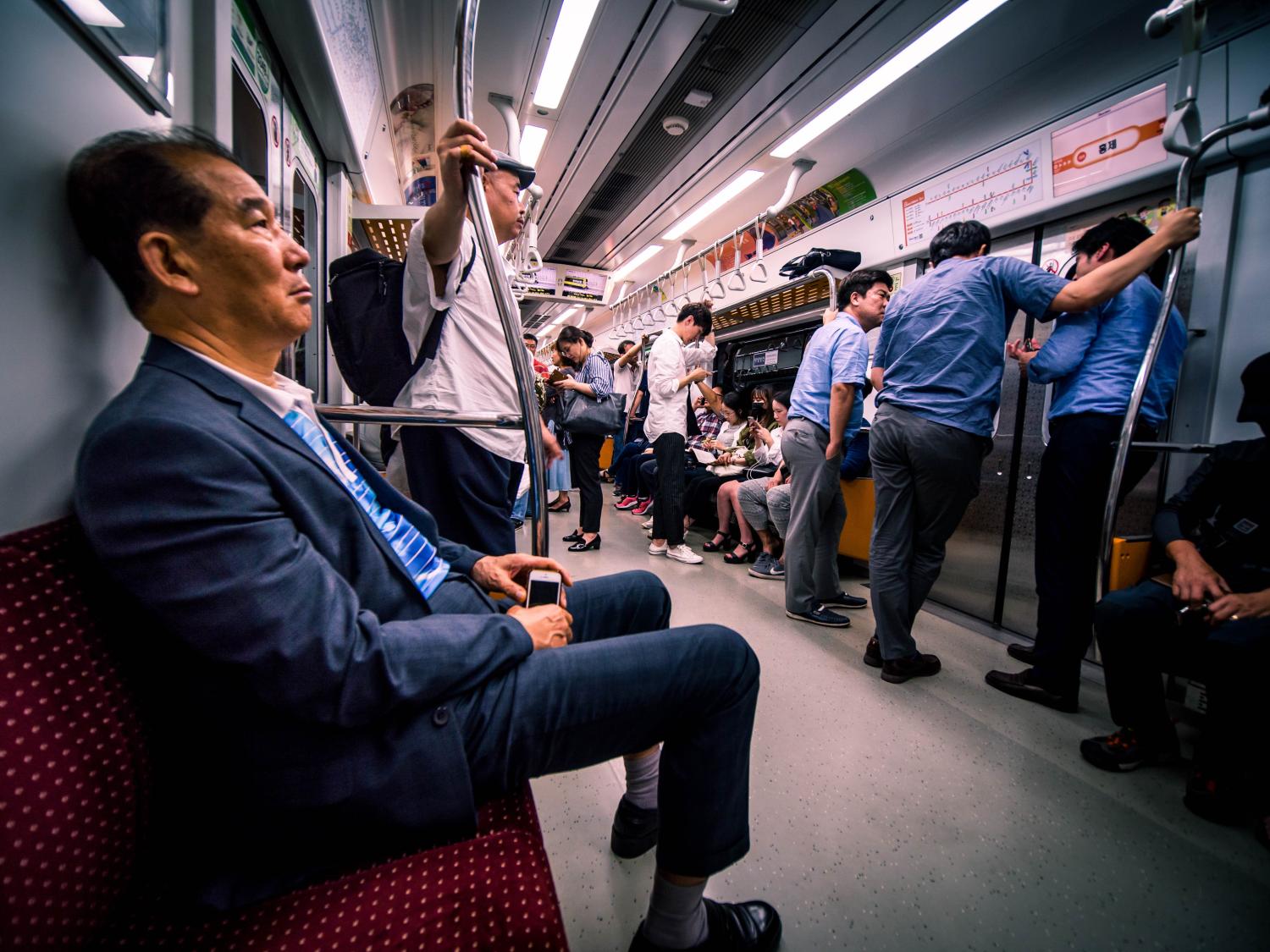 Seoul ,South Korea - September 5 2017 : many people in subway has a look tired after finish working