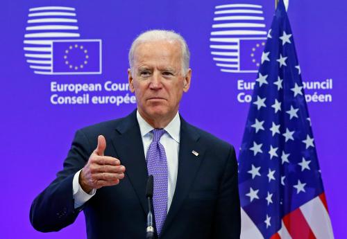 U.S. Vice President Joe Biden holds a joint statement with European Council President Donald Tusk ahead of a meeting at EU Council headquarters in Brussels February 6, 2015. Biden said on Friday that the United States and Europe needed to stand together over Ukraine and accused Russian President Vladimir Putin of calling for peace while rolling his troops through Ukrainian countryside.REUTERS/Yves Herman (BELGIUM - Tags: POLITICS)