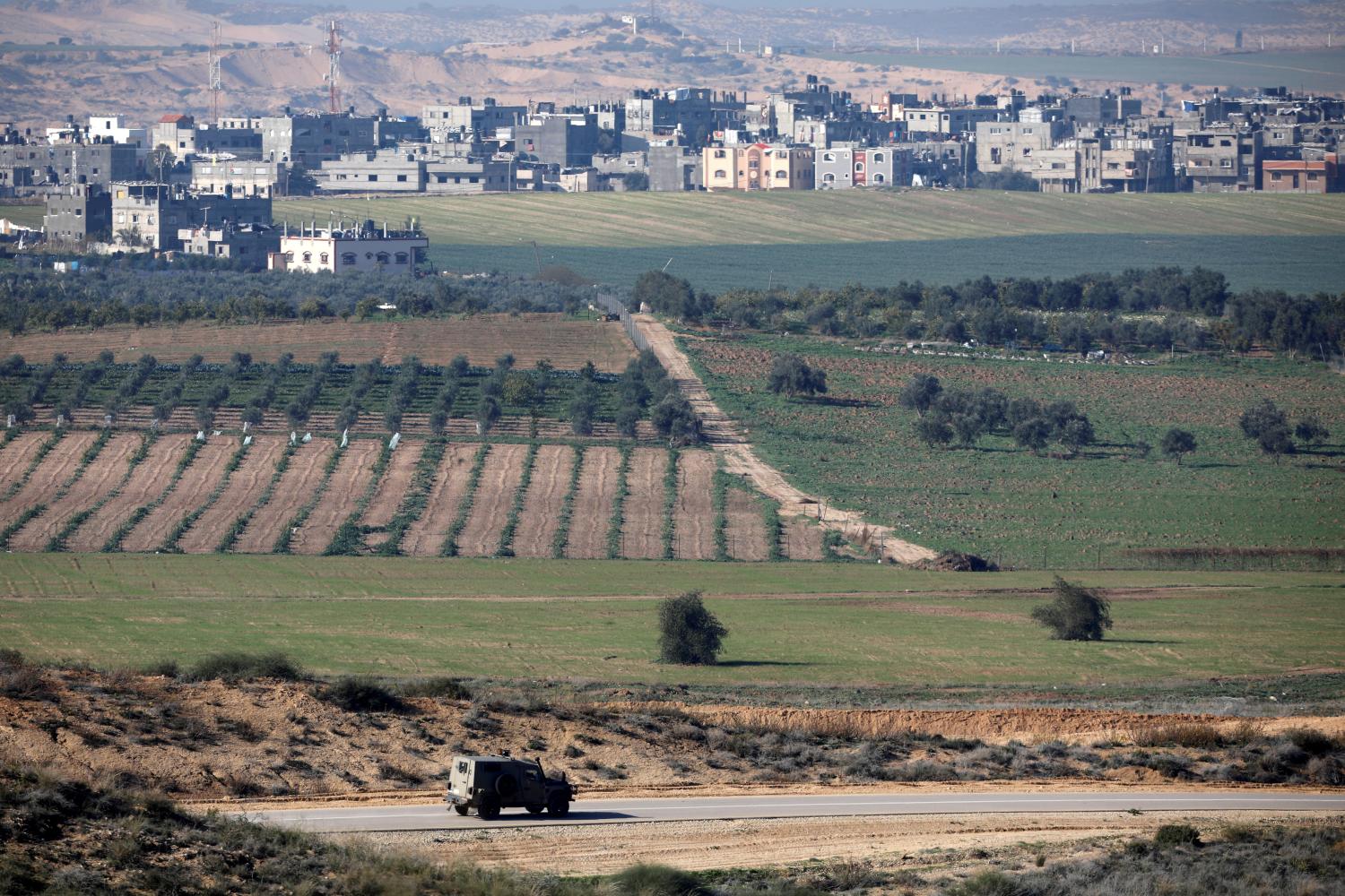 An Israeli military jeep drives along the Israeli side of the border with the northern Gaza Strip, Israel January 8, 2018. Picture taken January 8, 2018. REUTERS/Amir Cohen