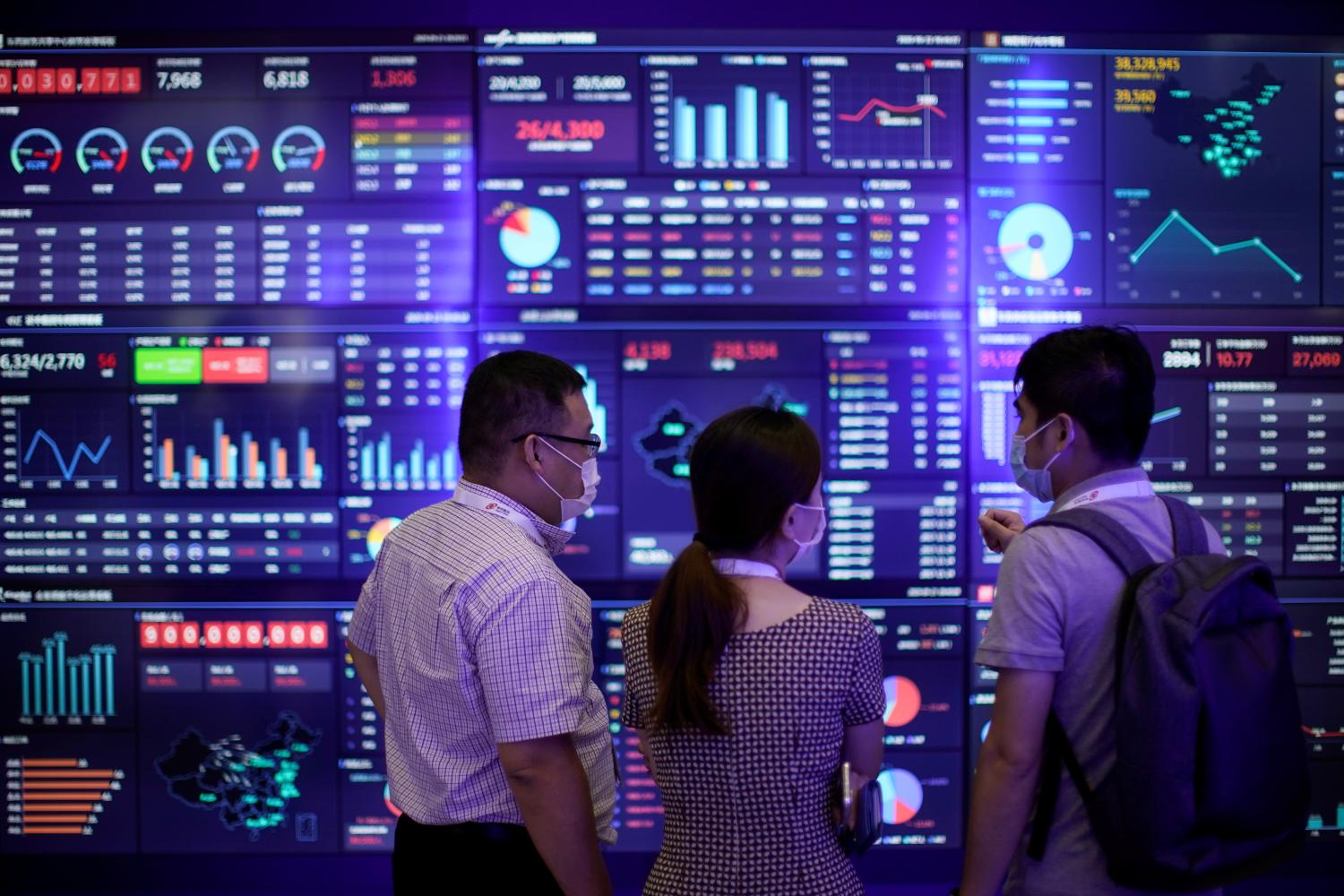 People visit a booth during the Huawei Connect conference in Shanghai, China.